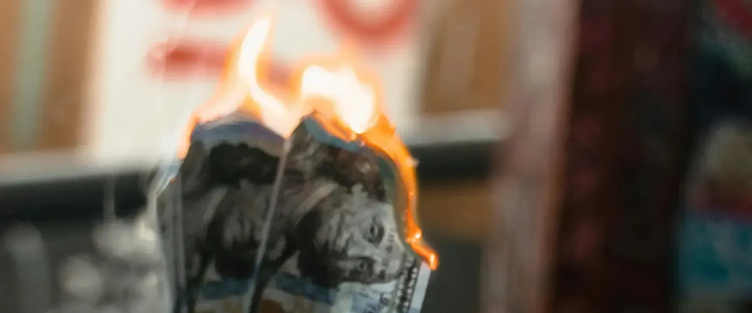 [Photo by MART  PRODUCTION](https://www.pexels.com/photo/person-holding-burning-money-7230878/)