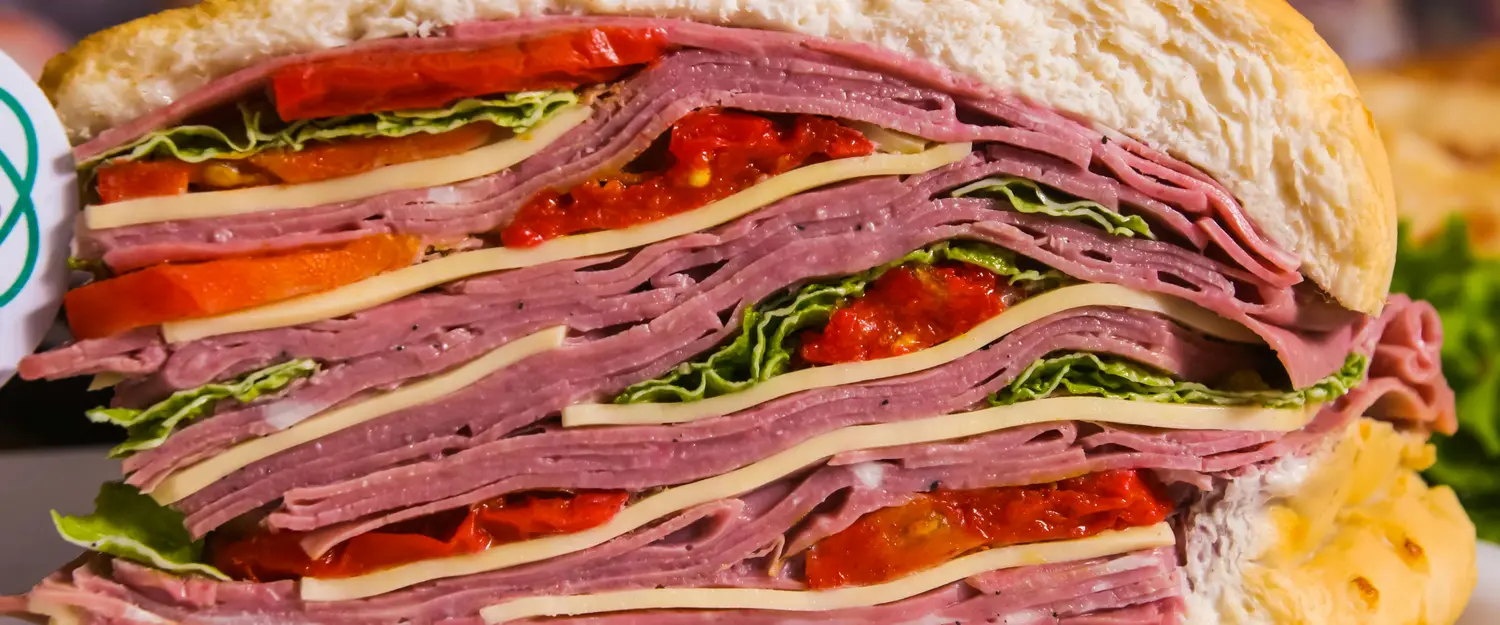 A photo of sandwitch with many layers, symbolizing Docker layers